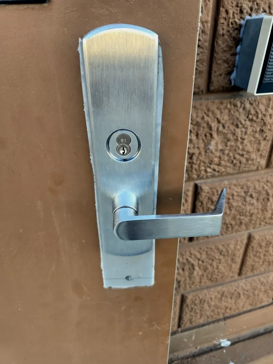 Commercial lever lock on a business door
