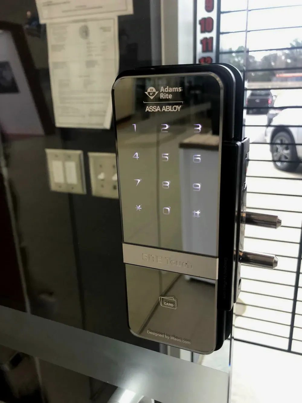 Keypad lock on a glass business door
