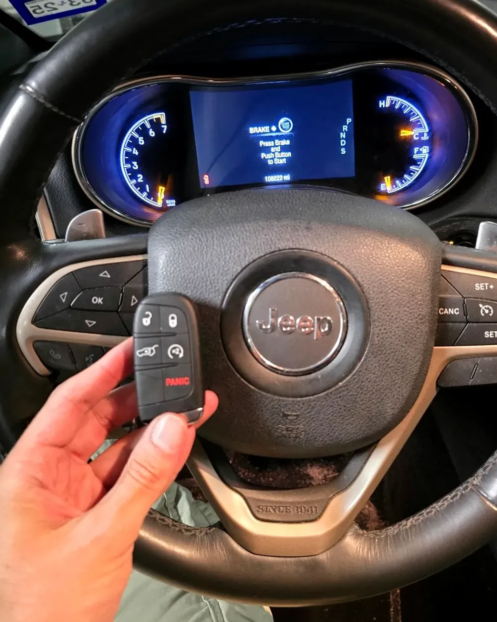New Jeep smart key held at the steering wheel after a job in Malverne, NY