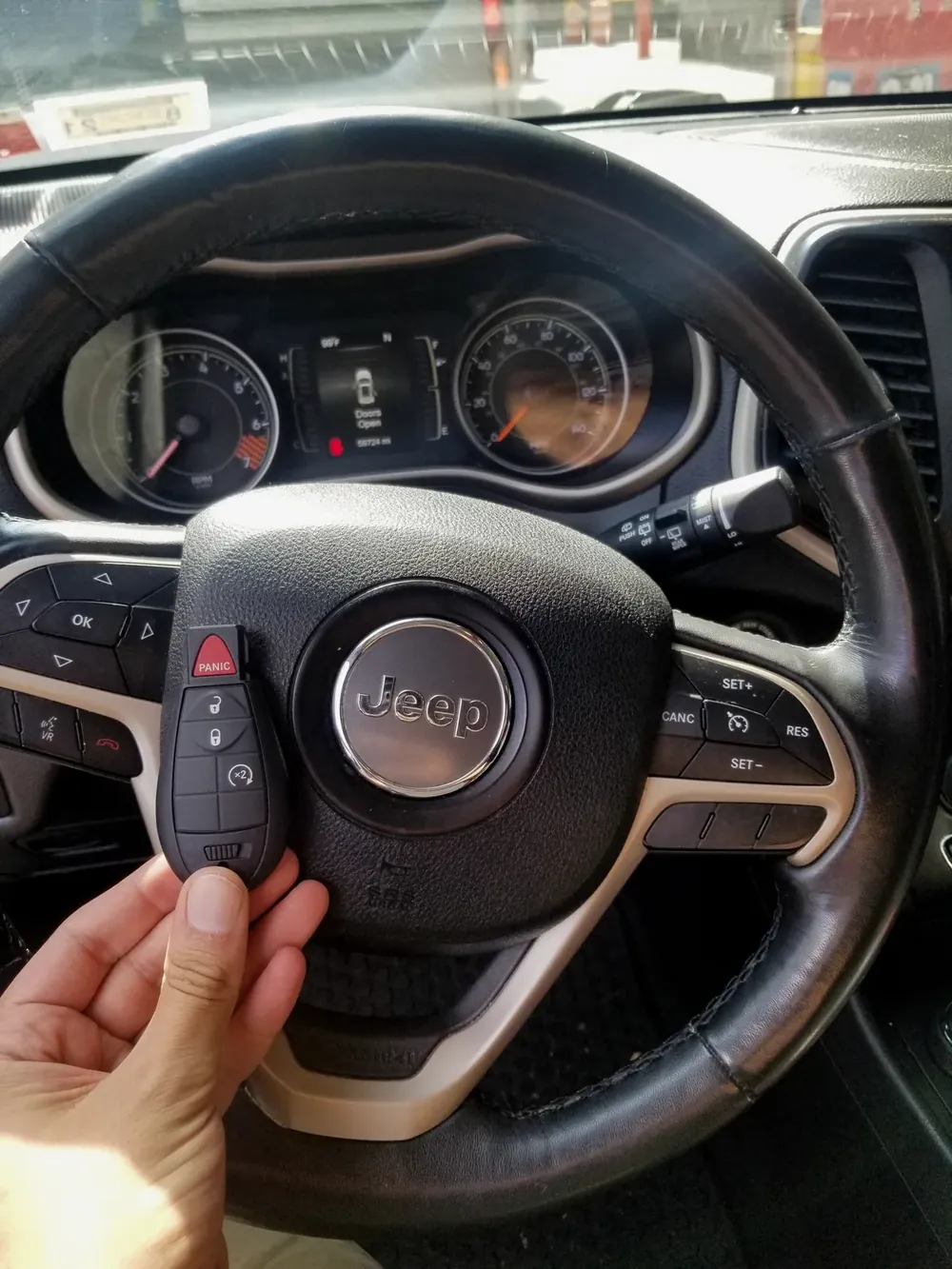 New Jeep smart key at the steering wheel