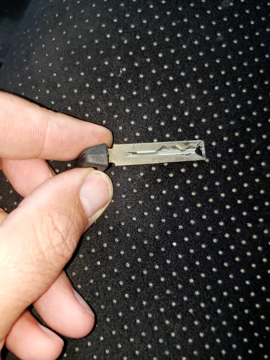 Car key with a plain plastic head and a chip inside