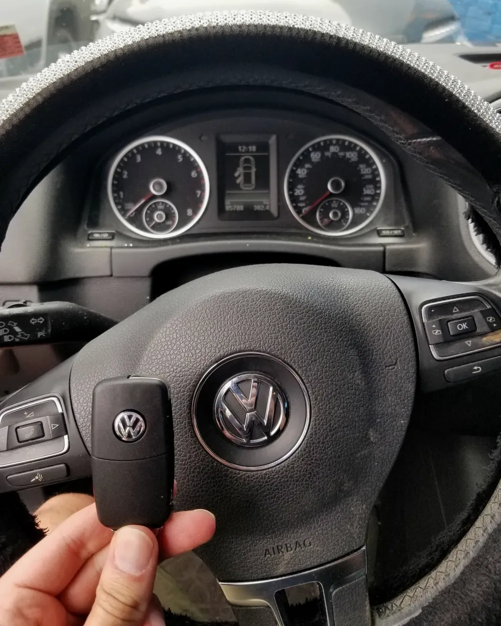 New Volkswagen remote key held at the steering wheel after a job in Lawrence, NY