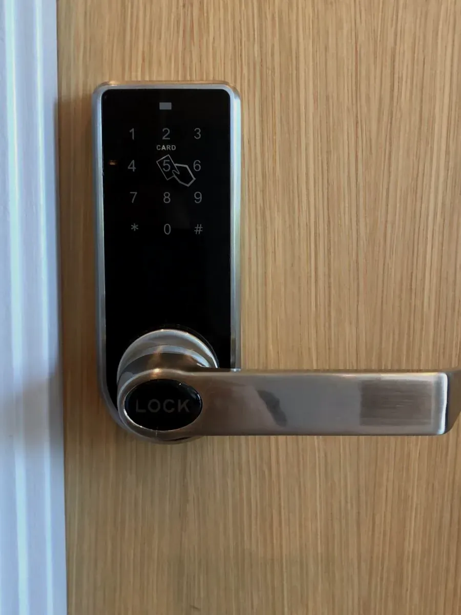 Keypad lever lock on a wood door